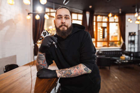 Portrait of professional creative tattoo masterの写真素材