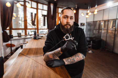 Portrait of professional creative tattoo masterの写真素材