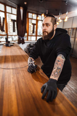 Portrait of professional creative tattoo masterの写真素材