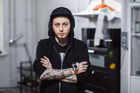 Portrait of professional creative tattoo masterの写真素材