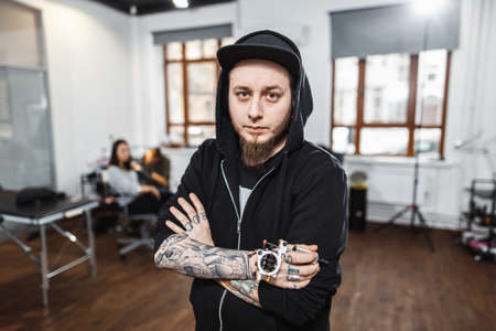 Portrait of professional creative tattoo masterの写真素材