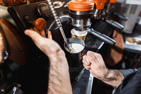 Making an espresso and cappuccino.の写真素材