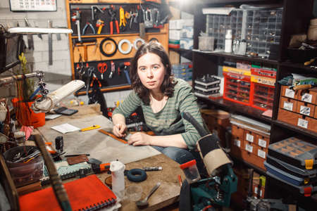 Working process in the leather workshop.の写真素材