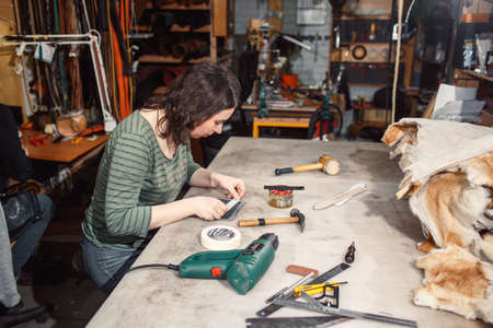 Working process in the leather workshop.