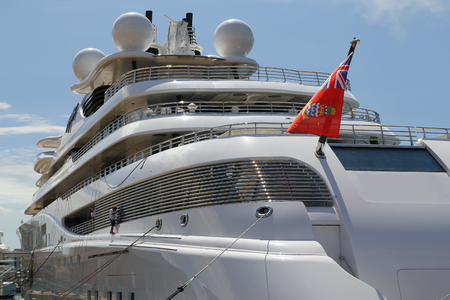 Luxury yacht moored on harborの写真素材