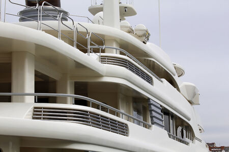 Luxury yacht moored at harborの写真素材