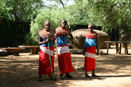SAMBURU RESERVE, KENYA - JUNE 08, 2009  Group of african girls from Samburu tribe in Kenya, show their traditional clothes on June 08, 2009 in a local village near Samburu National park のeditorial素材