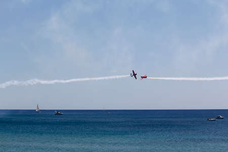TARRAGONA, SPAIN, APRIL 20, 2013  Repsol aircrafts taking part in an exhibition on the first airshow of Tarragona on April 20, 2013, in Tarragona, Spainのeditorial素材
