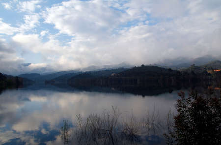Foggy landscape in a lakeの写真素材