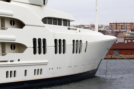 Luxury yacht moored on harborの写真素材