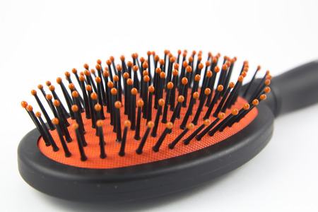 Hairbrush close up isolated on white backgroundの写真素材