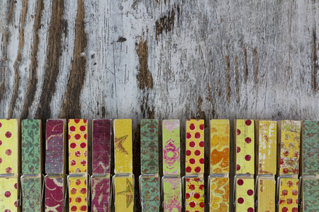 Handmade clothespins in a wood background, vintageの写真素材