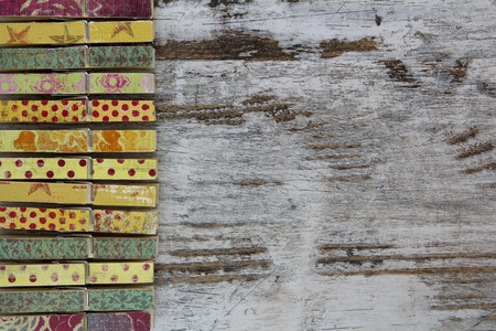 Handmade clothespins in a wood background, vintageの写真素材