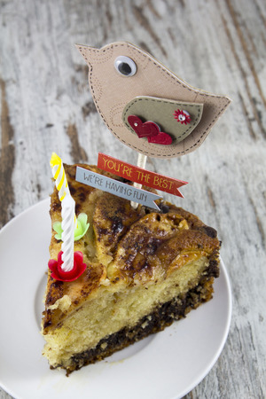 Decorated piece of cake for a special celebrationの写真素材