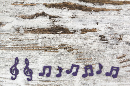 Musical notes in a wood backgroundの写真素材
