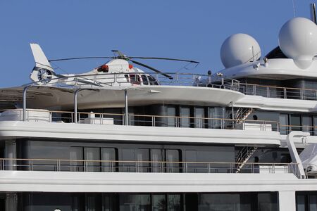 White helicopter in a luxury yachtの写真素材