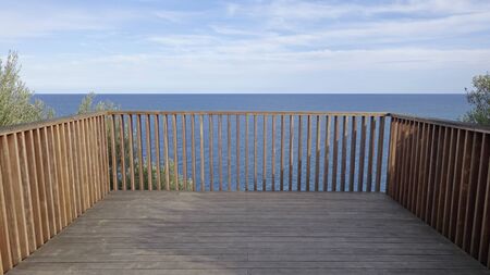 Wooden balcony to the seaの写真素材