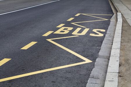 Parking zone for bus, in a public roadの写真素材