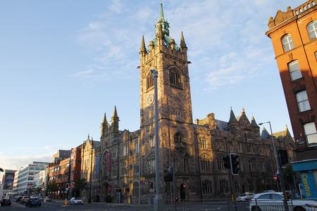 BELFAST, NORTHERN IRELAND - AUGUST 07, 2015: City view of Belfast at northern Ireland, with the old Assembly  building and tower, on august 07, 2015 in Europeのeditorial素材