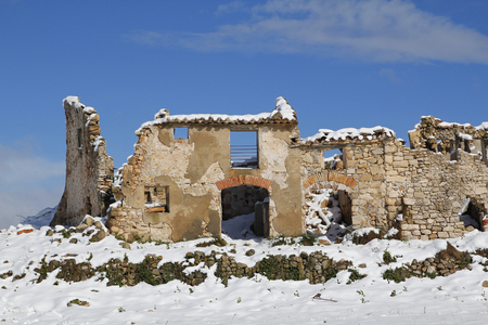 Old abandoned village of Gallicant in Catalonia, Spain. Winter with snowの写真素材