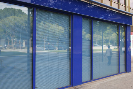 Closed office in the street, in blue tonesの写真素材