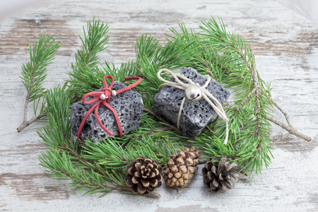 Christmas coal and pine leaves, sweet gift for naughty boysの写真素材