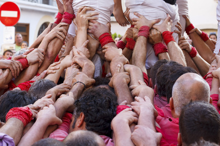Union of people making human towers, castellers in Cataloniaのeditorial素材