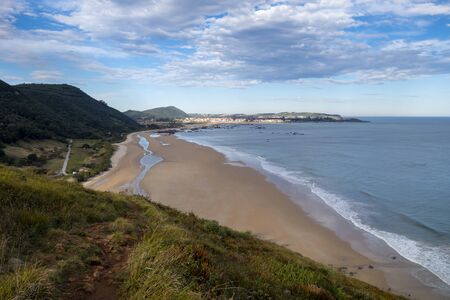 Helgueras sand beach in the north coast of Spain, next to Noja village in Cantabria