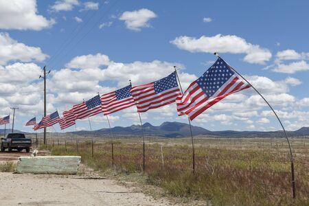 United States flags in the desert of Arizona, patriotic symbol of America in the wind
