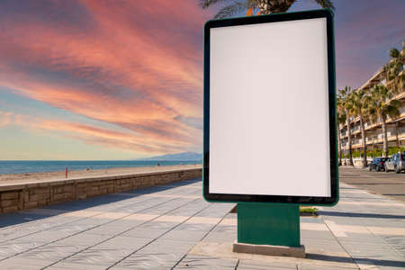 Blank billboard mock up for advertising, against blue skyの写真素材