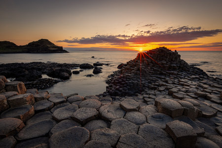 Gorgeous sunset at Giants Causeway, Bushmills, Northern Ireland, United Kingdomの写真素材