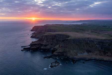 Gorgeous Sunset over Giants Causeway, Bushmills, Northern Ireland United Kingdomの写真素材