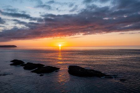 Gorgeous Sunset Over Ballintoy, Antrim Coast, Northern Ireland, United Kingdomの写真素材