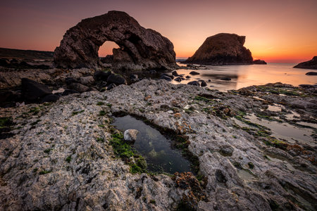 Gorgeous sunrise at Ballintoy Harbour, Ballycastle, Northern Irelandの写真素材