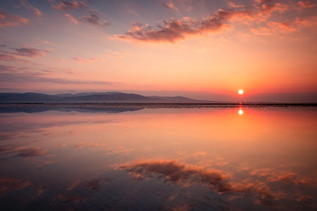 Stunning sunrise over Dundalk Bay, Blackrock beach, Louth Irelandの写真素材