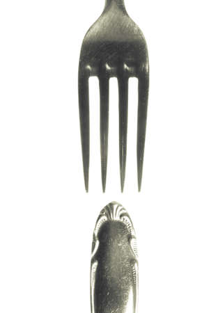 two parts of a fork on white background