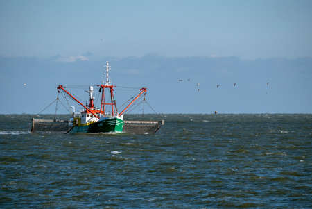 Fishing boat near the Zuidpier (IJmuiden)の写真素材