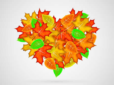 Heart shape made from autumn leaves. Space for text. Vector illustrationのイラスト素材