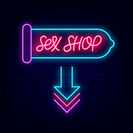 Sex Shop neon lettering with condom frame on brick wall background. Shiny arrow.の写真素材