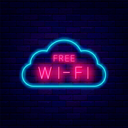 Free Wifi neon signboard on brick wall. Cloud frame. Internet emblem for cafe and bar. Outer glowing effect poster. Editable stroke. Vector stock illustrationの写真素材