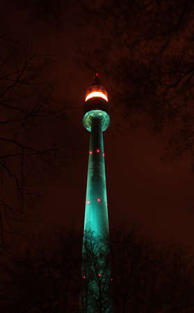 Communication tower at night lightsの写真素材