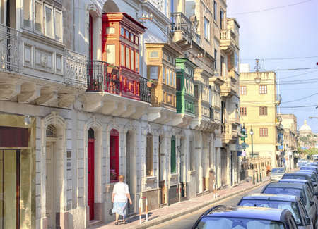 Colorful classic balcons on Maltese old city street.の写真素材