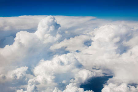 Sky clouds background. Top view of the plane