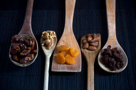 Dried Fruit and Nuts on Wooden Spoons