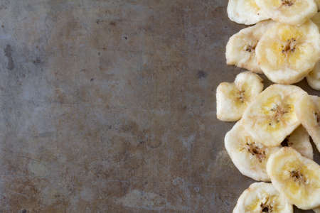 Close Up of Dried Banana Chips from Aboveの写真素材