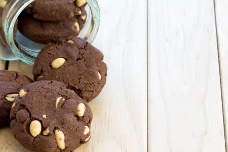 Peanut Brownie Cookies in a Jar on Table from Above with Copy Space - Horizontalの写真素材