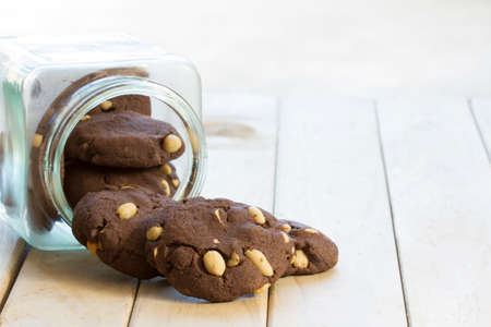 Peanut Brownie Cookies in a Jar on Table with Copy Space - Horizontalの写真素材