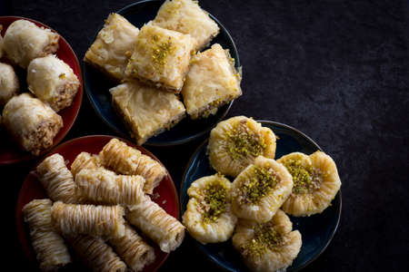 Variety of Baklava on Dark Background From Above with Copy Spaceの写真素材