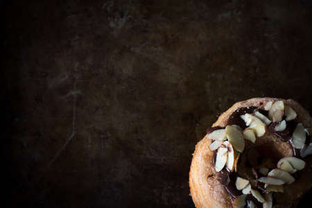 Rustic Cronut from Above on Dark Background with Copy Spaceの写真素材