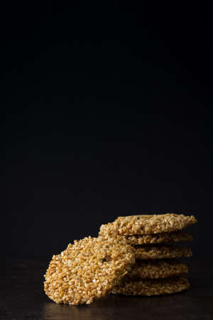 Middle Eastern Eid Cookies Filled with Dates in a Stack on Light Background Copy Space Verticalの写真素材
